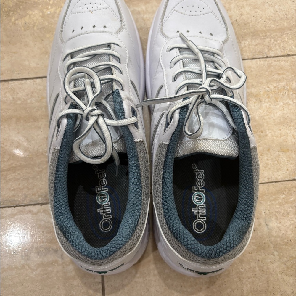 White and Gray Athletic Shoes with Minimalist Design